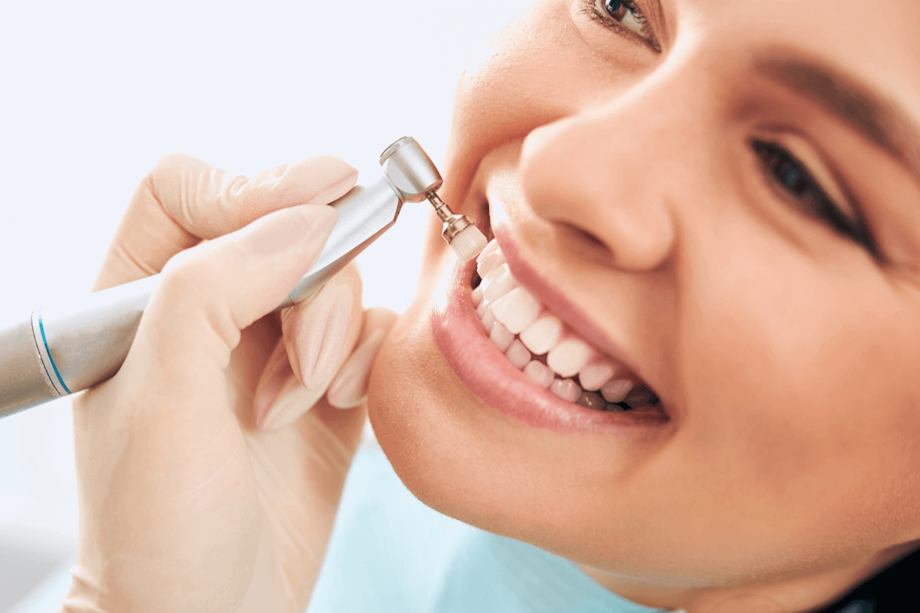 Woman getting teeth cleaned